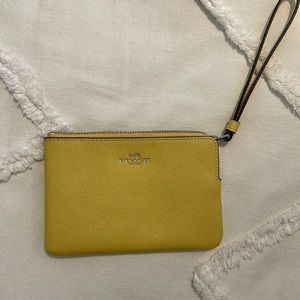 Like new, yellow Coach wristlet